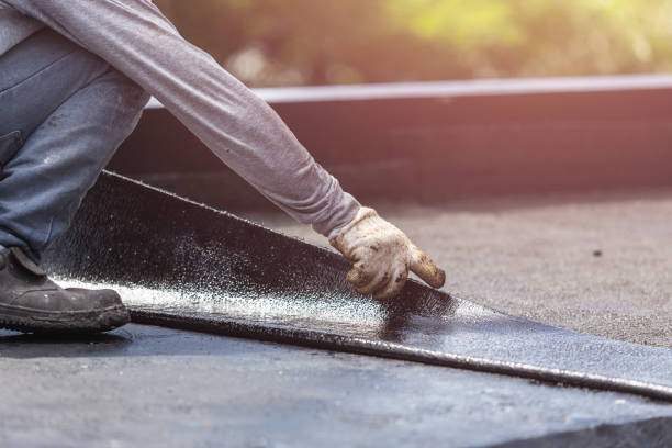 Professional Waterproofing technician working in Burgoon, OH